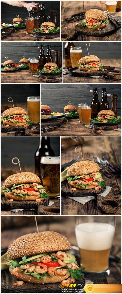Variety burgers with light beer on a wooden table 9X JPEG