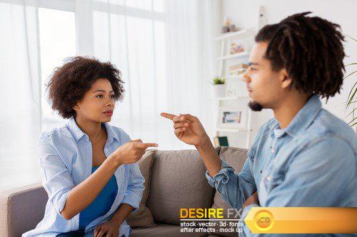 Unhappy couple having argument at home 9X JPEG