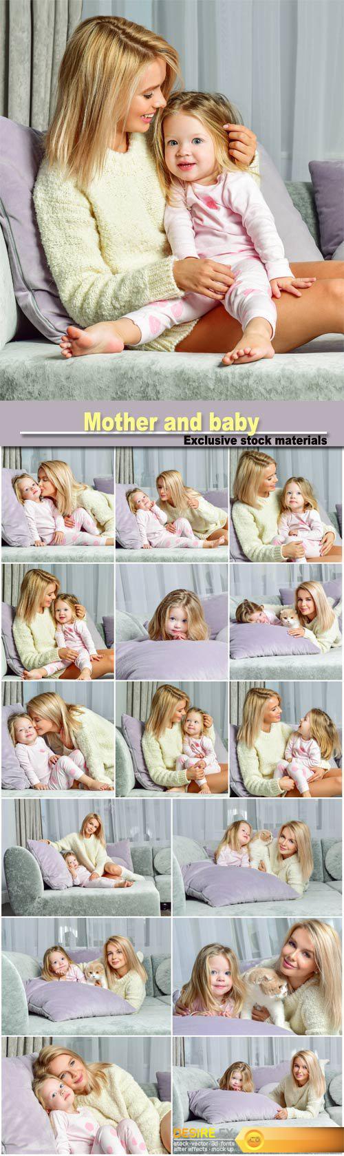 Mother and baby playing and smiling, happy family at home interior