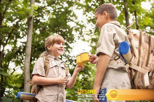 Little boys and girl on hiking with backpack in forest 19X JPEG