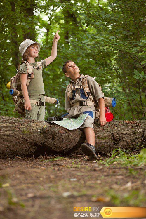 Little boys and girl on hiking with backpack in forest 19X JPEG