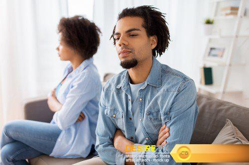 Unhappy couple having argument at home 9X JPEG