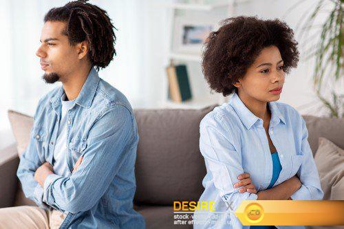 Unhappy couple having argument at home 9X JPEG