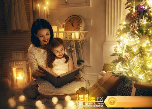 Happy family at Christmas, mother and daughter decorate the Christmas tree and exchange gifts