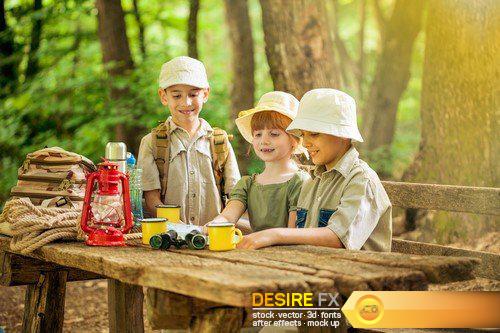 Little boys and girl on hiking with backpack in forest 19X JPEG