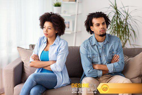 Unhappy couple having argument at home 9X JPEG