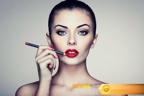 Beautiful woman paints lips with lipstick - 13 UHQ JPEG