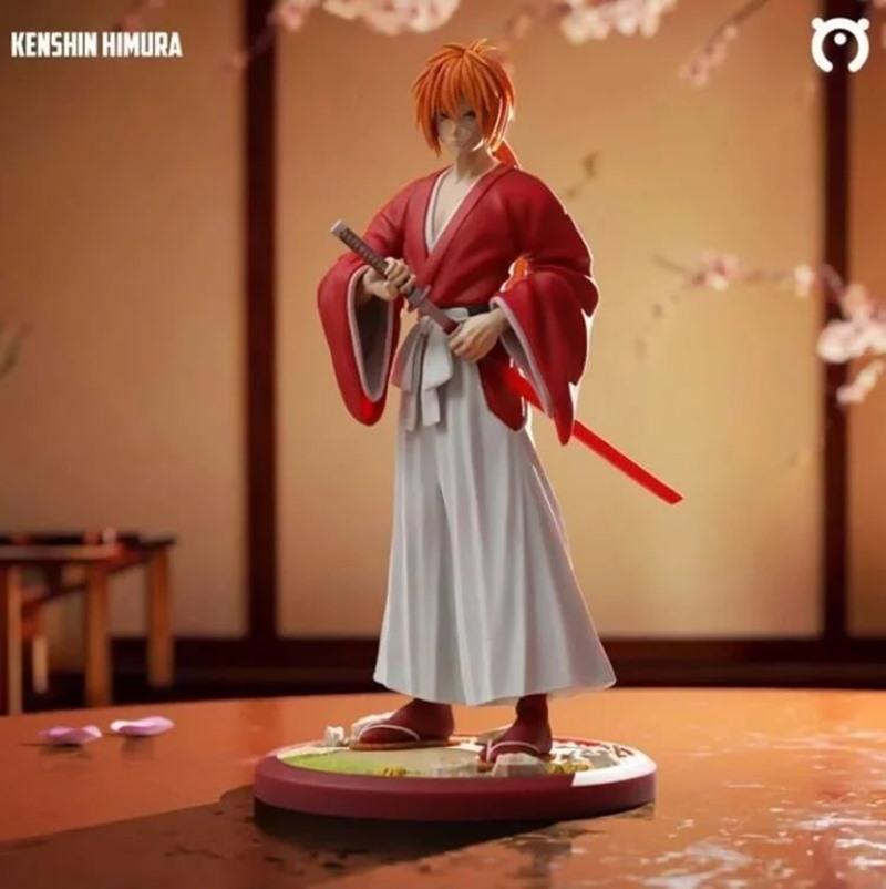 Kenshin Himura 3D model figure in red kimono and white hakama, holding a sword with a red blade, standing on a circul...