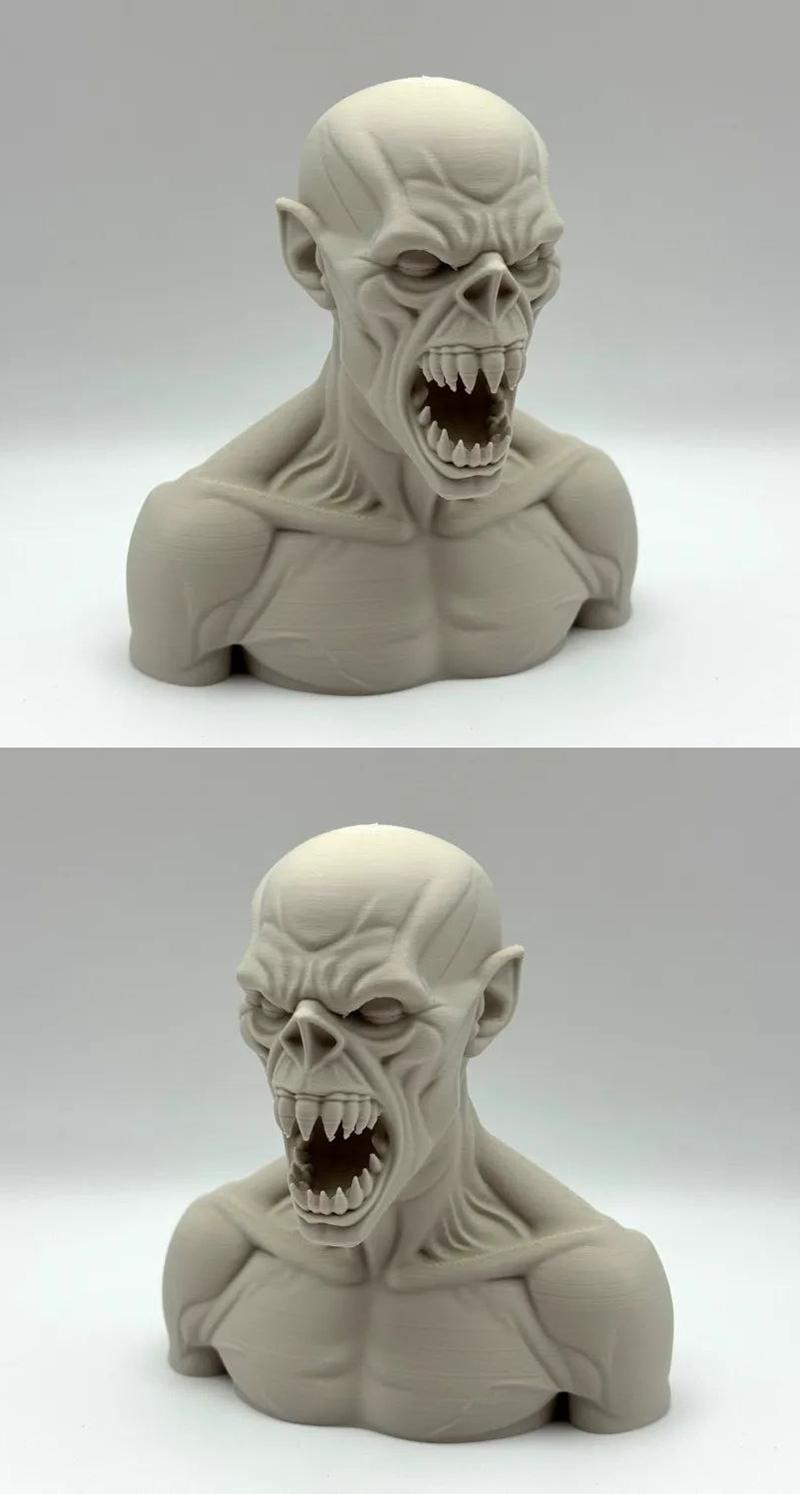 3D printable bust of a snarling horror creature with sharp teeth and detailed musculature.