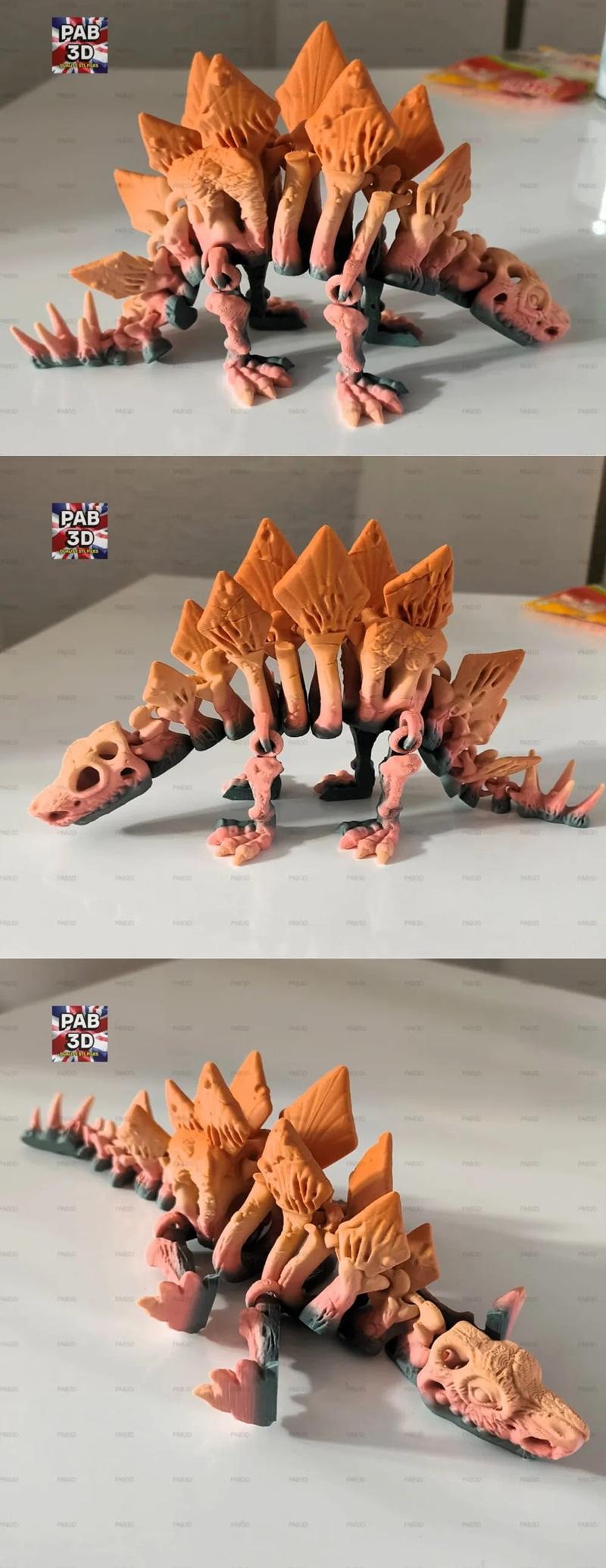 Articulated flexi dinosaur 3D print model, resembling a Stegosaurus, with segmented body, pink and orange gradient co...