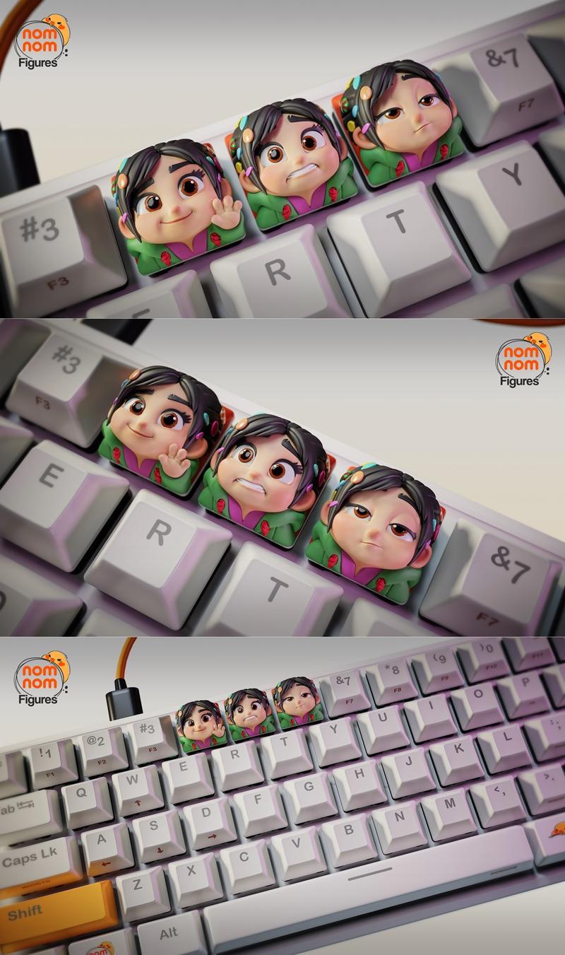 Set of four 3D printed keycaps featuring Vanellope Von Schweetz from Wreck-It Ralph, each with a different expression...