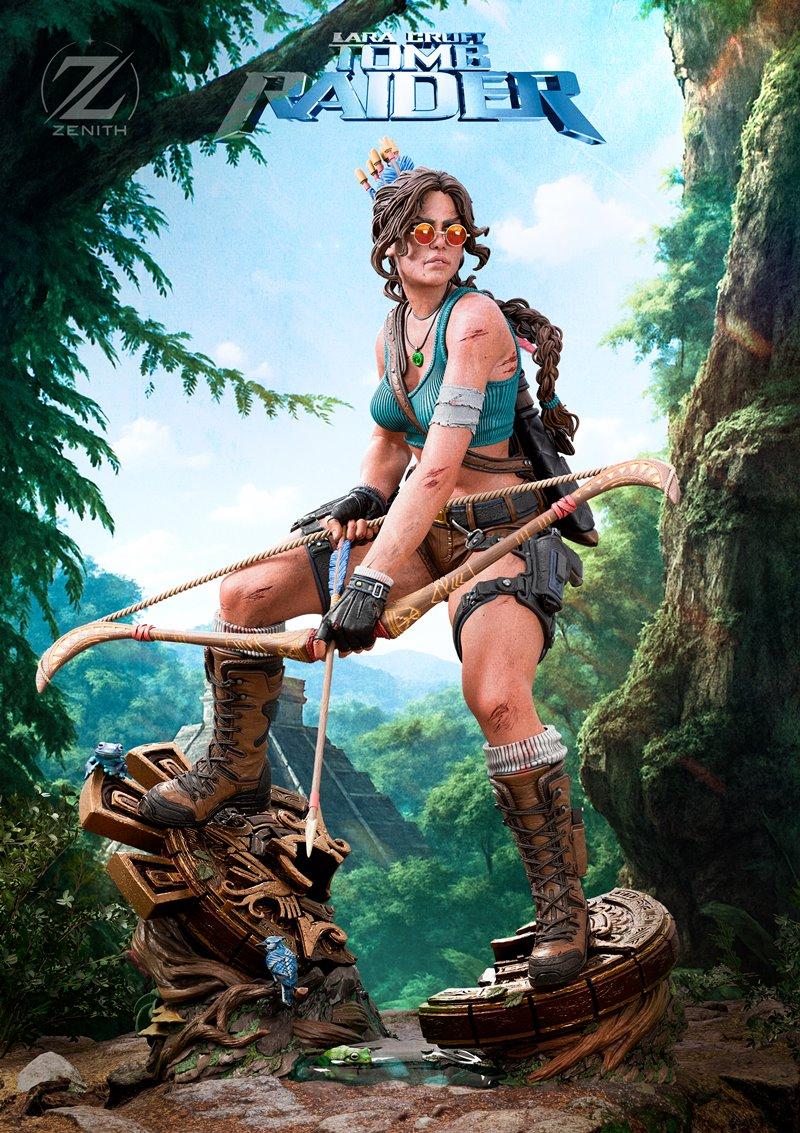 Lara Croft figure with bow drawn, wearing sunglasses and teal top, standing on jungle ruins. Zenith Studios model.