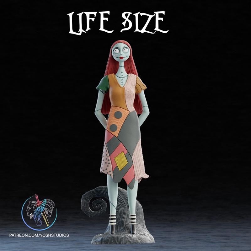 Life Size Sally figure from Nightmare Before Christmas, standing with hands behind back, wearing a patchwork dress an...