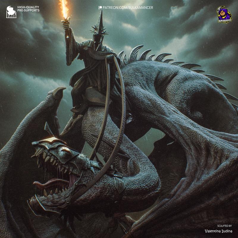 Witch-King of Angmar riding a dragon, holding a flaming sword aloft. The figure wears dark armor and a spiked crown....
