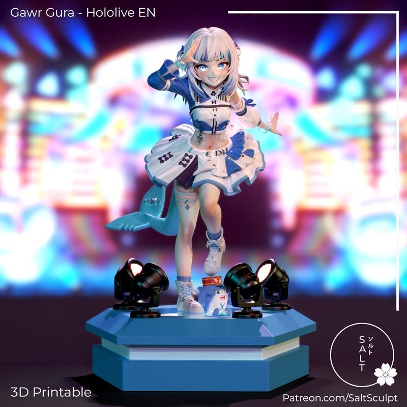 Gawr Gura figure in blue and white outfit with shark tail, posed on a blue stage with spotlights. Saltsculpt 3D print...
