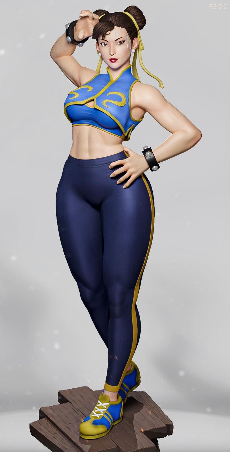 Chun-Li figure in blue and yellow athletic wear, standing on a wooden platform, hands on hips, with hair in twin buns.