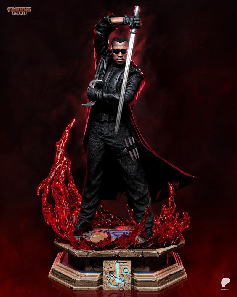 Blade figure in black leather coat and pants, holding a sword overhead and a smaller blade in his other hand, standin...