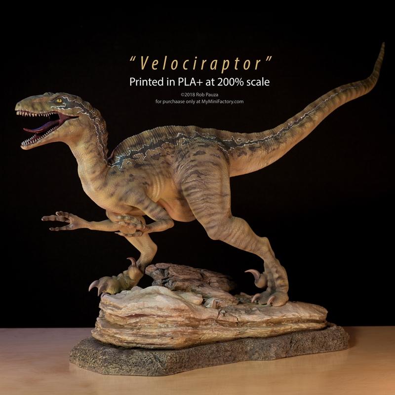 Velociraptor figure in a running pose on a rocky base, detailed scales and stripes, printed at 200% scale by Rob Pauza.