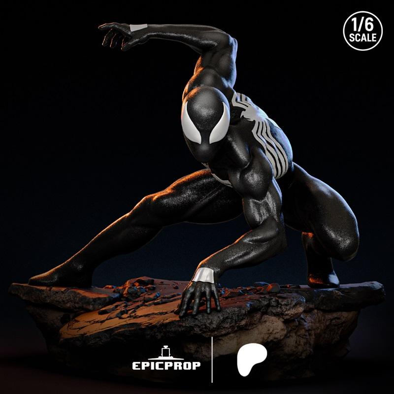 Venom symbiote figure in a crouched, ready-to-strike pose on a rocky base. Black suit with white spider emblem and ey...