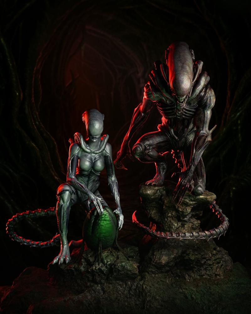 Two Xenomorph figures, one standing in a crouched pose on rocks, the other seated with a green Xenomorph egg. Dark, a...