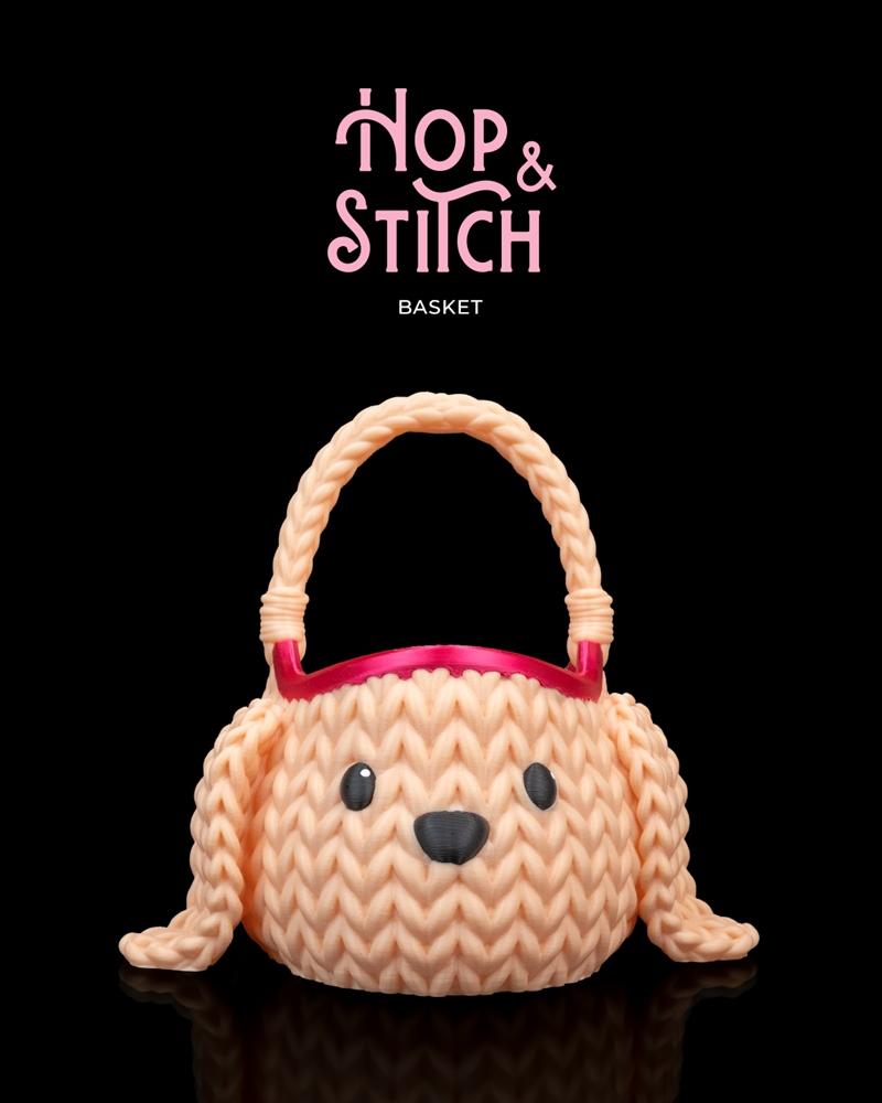3D printable basket designed as a cute, knitted dog with a braided handle and pink rim accent.