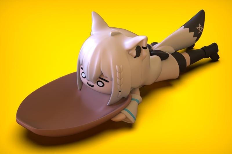 Chibi Shirakami Fubuki figure lying on a large spoon, wearing her signature outfit with fox ears and tail.