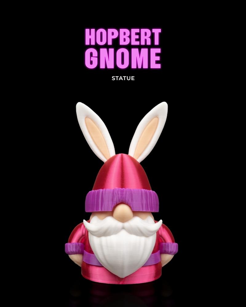 Hopbert Gnome statue with white bunny ears, pink hat and jacket, and purple trim. Features a long white beard and ros...