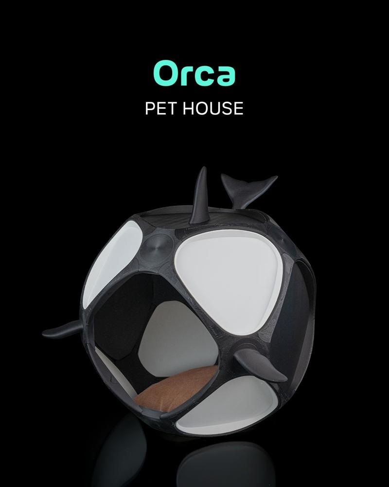 3D printable Orca Pet House with black and white markings, dorsal fin, and interior cushion.