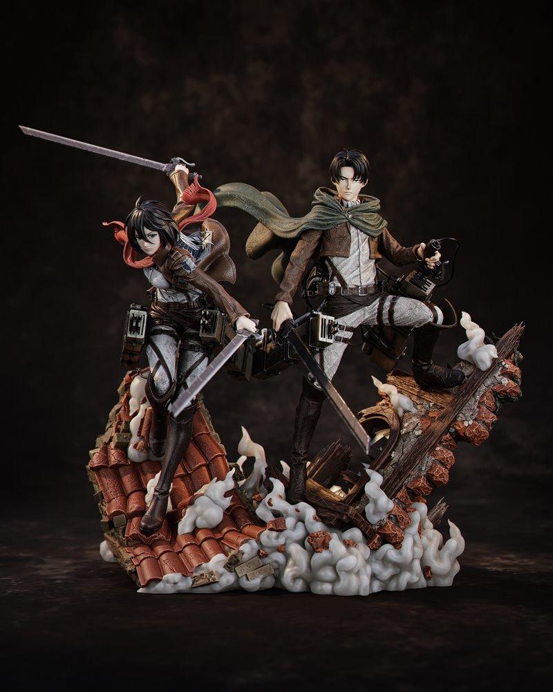 Mikasa Ackerman and Levi Ackerman diorama from Attack on Titan, posed dynamically on a rubble base, wearing Survey Co...