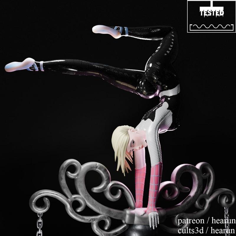 Gwen Stacy Spider-Woman 3D model in a handstand pose on an ornate base, wearing a black and white suit with pink spid...