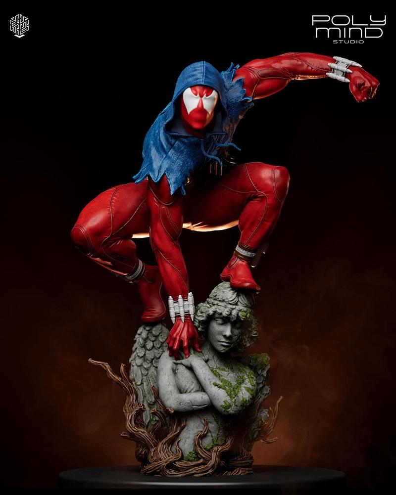 Scarlet Spider figure in a crouching, heroic pose, wearing a red suit and blue hooded cowl, standing on a moss-covere...