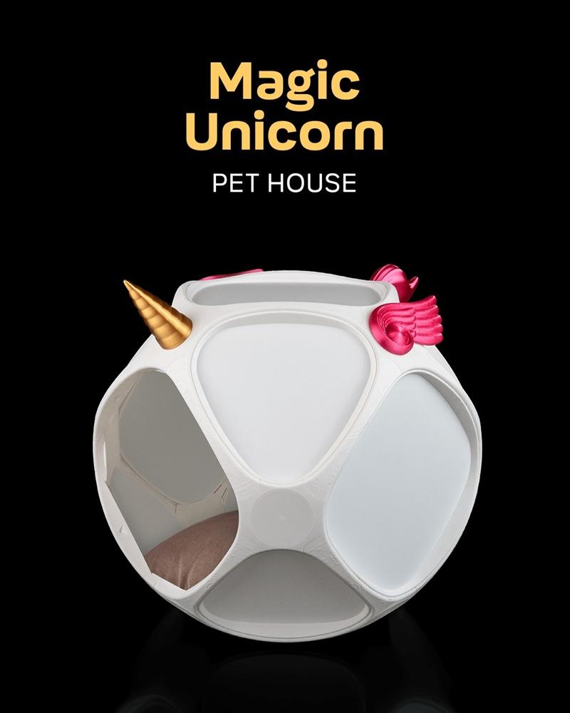 White spherical pet house with a golden unicorn horn and pink mane details, featuring multiple openings and a soft cu...
