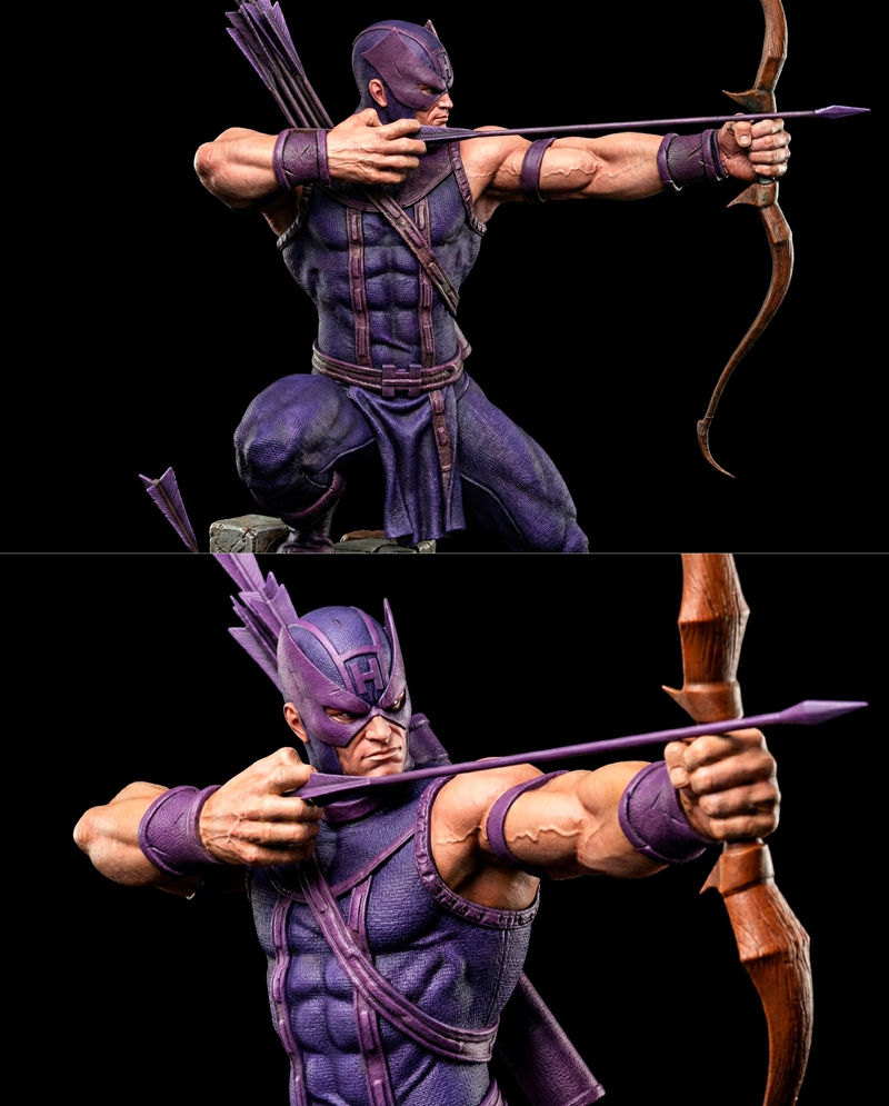 Hawkeye in purple costume drawing a bow and arrow, kneeling over a defeated robot on a stone base. Black Owl Customs...