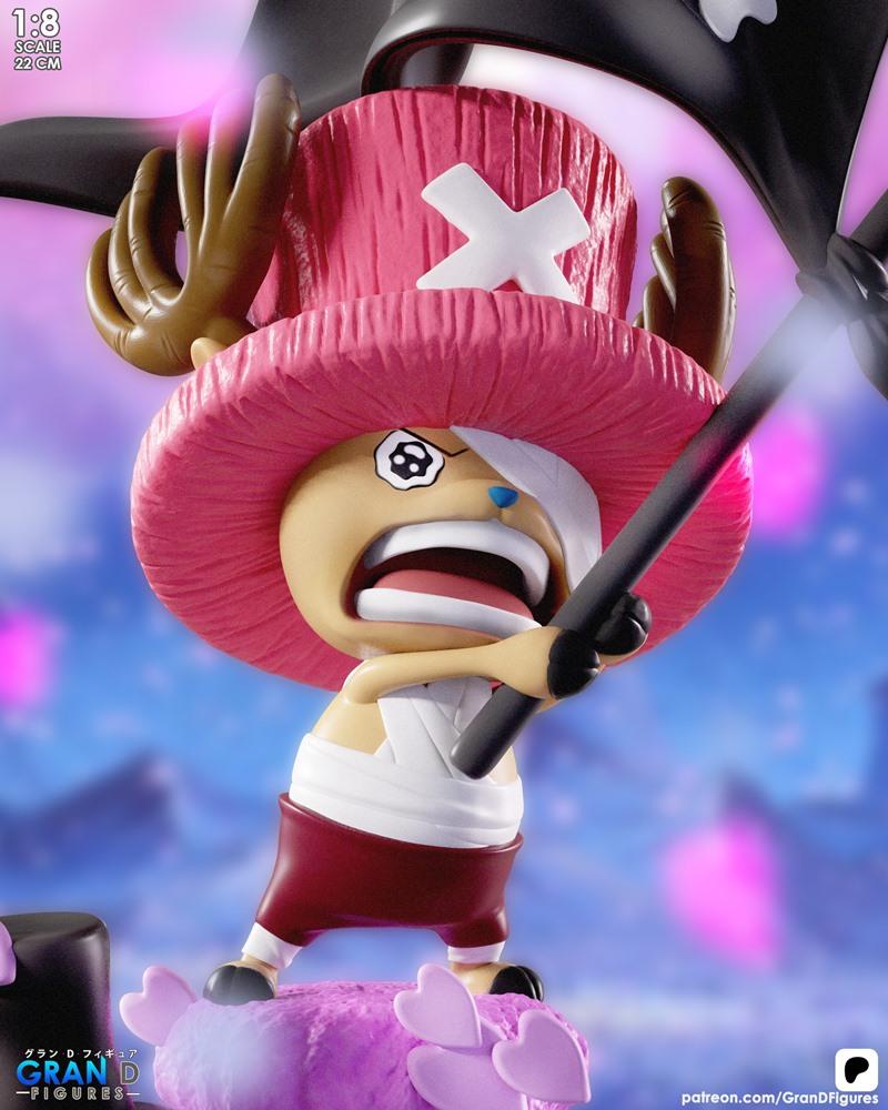 Tony Tony Chopper figure from One Piece, wearing a pink hat and red shorts, in an action pose holding a black pole. S...