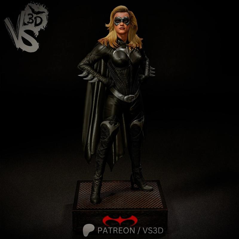 VS3D Batgirl figure in black leather suit with cape and mask, standing heroically on a patterned base.