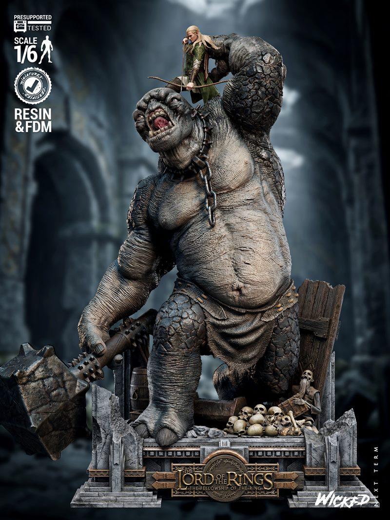 Legolas the elf archer aims his bow from atop a large, roaring troll wielding a mace, set on a diorama base with skul...
