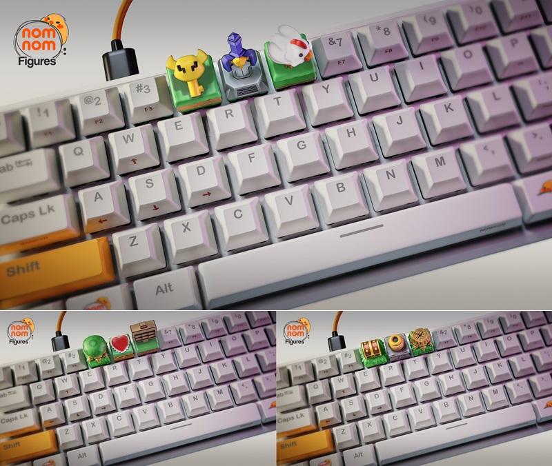 Close-up of a mechanical keyboard with custom 3D printed keycaps featuring The Legend of Zelda characters and items,...