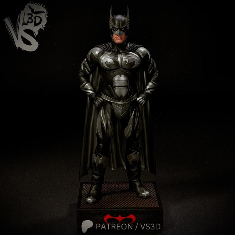 VS3D 3D model of Batman in a dark suit with silver accents and a cape, hands on hips, standing on a display base.