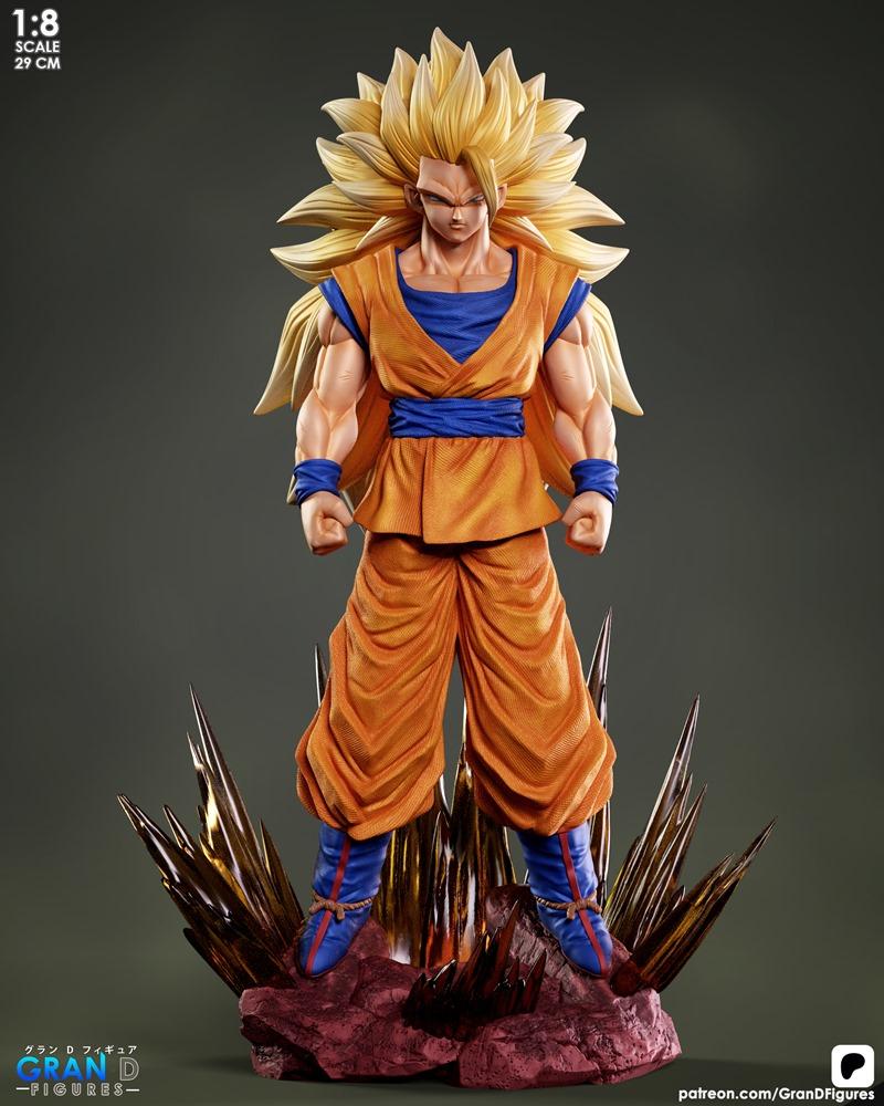 Goku SSj3 figure, 1:8 scale (29 cm), standing heroically on a rocky base with sharp crystals. He wears an orange gi w...