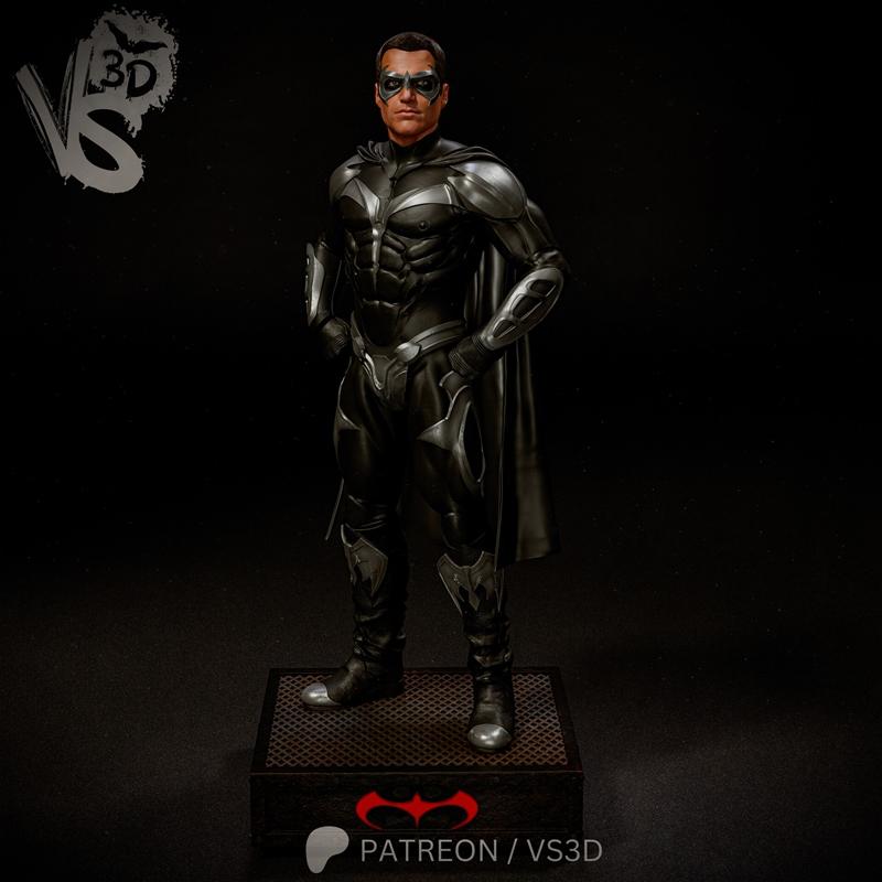 VS3D 3D model of Robin in a black and silver armored suit with a cape and mask, standing heroically on a base.