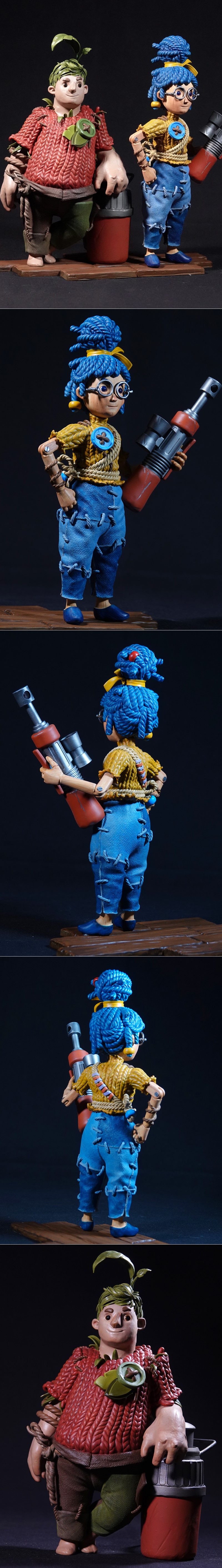 3D printed figures of Cody and May from It Takes Two, rendered in a claymation style. Cody wears a red knitted sweate...