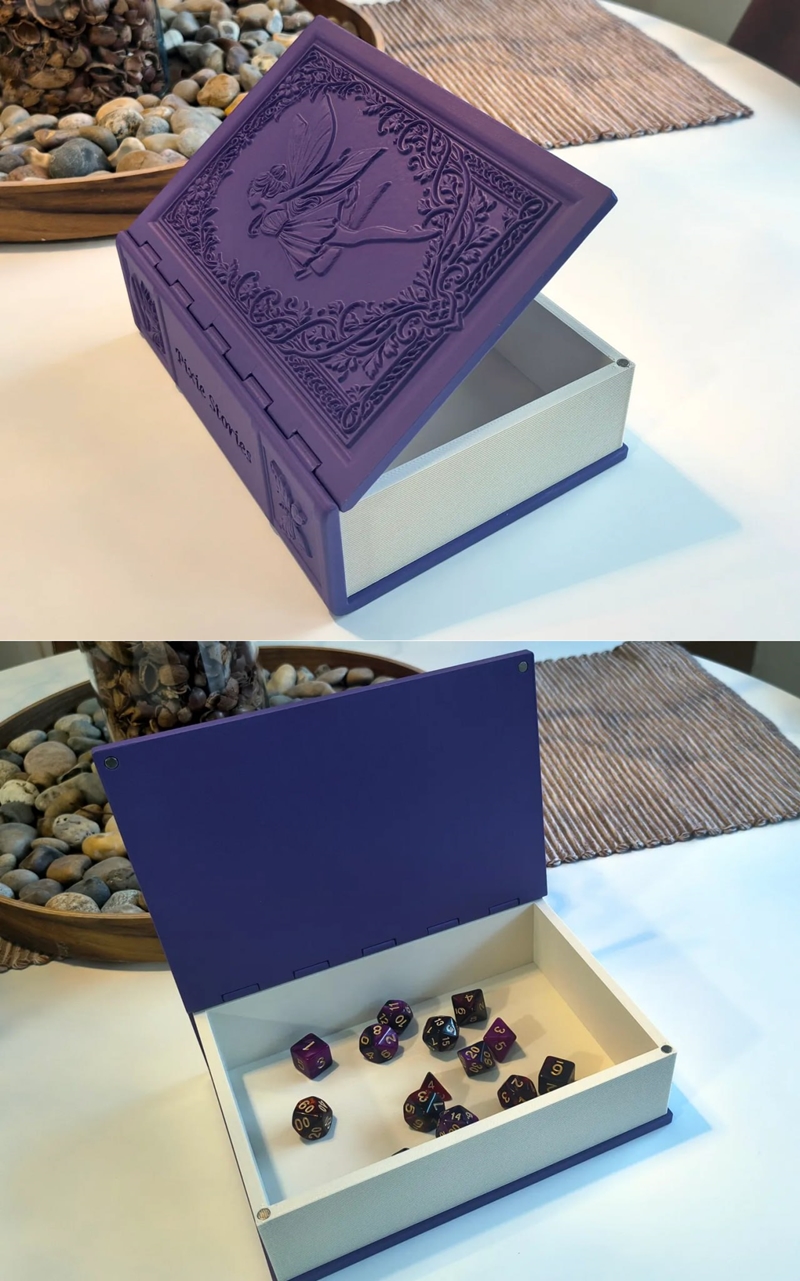 Purple 3D printed storage book designed to look like a fairy tale book, featuring a fairy on the cover and 'Pixie Sto...