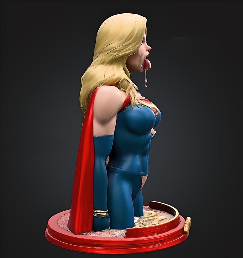 Bust of Supergirl in a blue costume with red cape, 'S' shield emblem, and suggestive facial expression, on a red base.