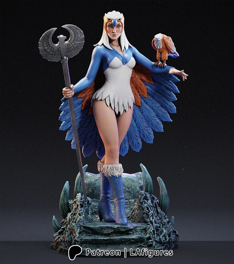 Sorceress figure from Masters of the Universe, holding a staff and with a bird on her arm, wearing a blue and white a...