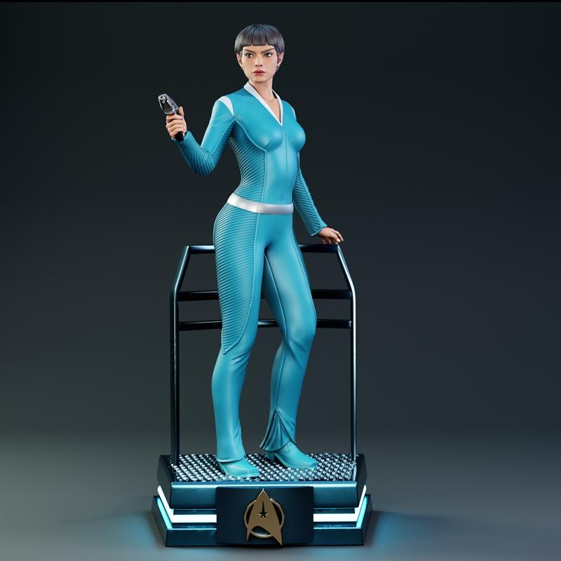 3D model of T'Pol Enterprise from Star Trek in a blue uniform, holding a tricorder, standing on a futuristic base wit...