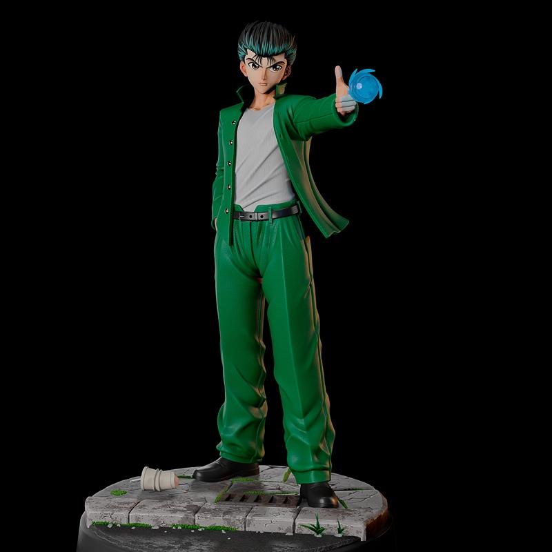 Yusuke Urameshi from Yu Yu Hakusho anime series, wearing a green uniform and emitting a blue energy blast from his ha...