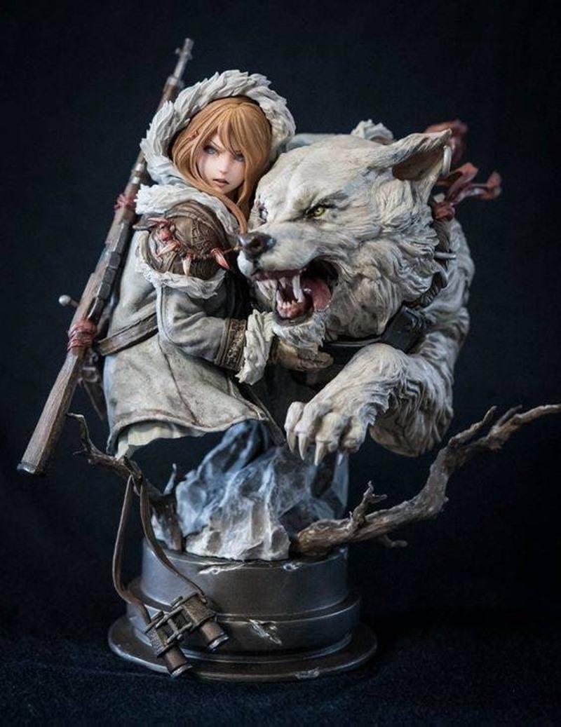 3D model figure of a girl in a fur-lined hooded coat holding a rifle, alongside a snarling wolf. Binoculars are attac...