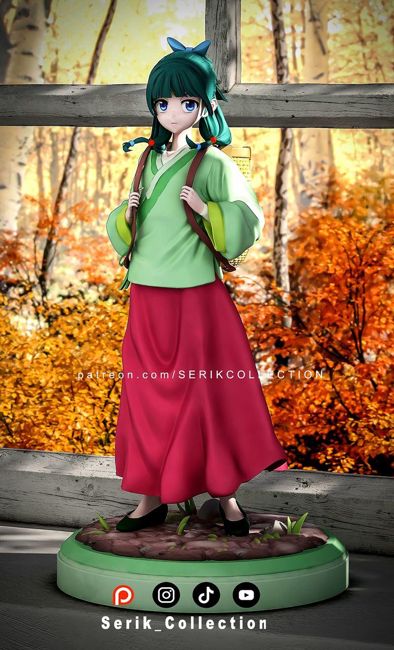 Anime-style 3D model of Maomao from The Apothecary Diaries, wearing a green robe and red skirt, with a basket on her...