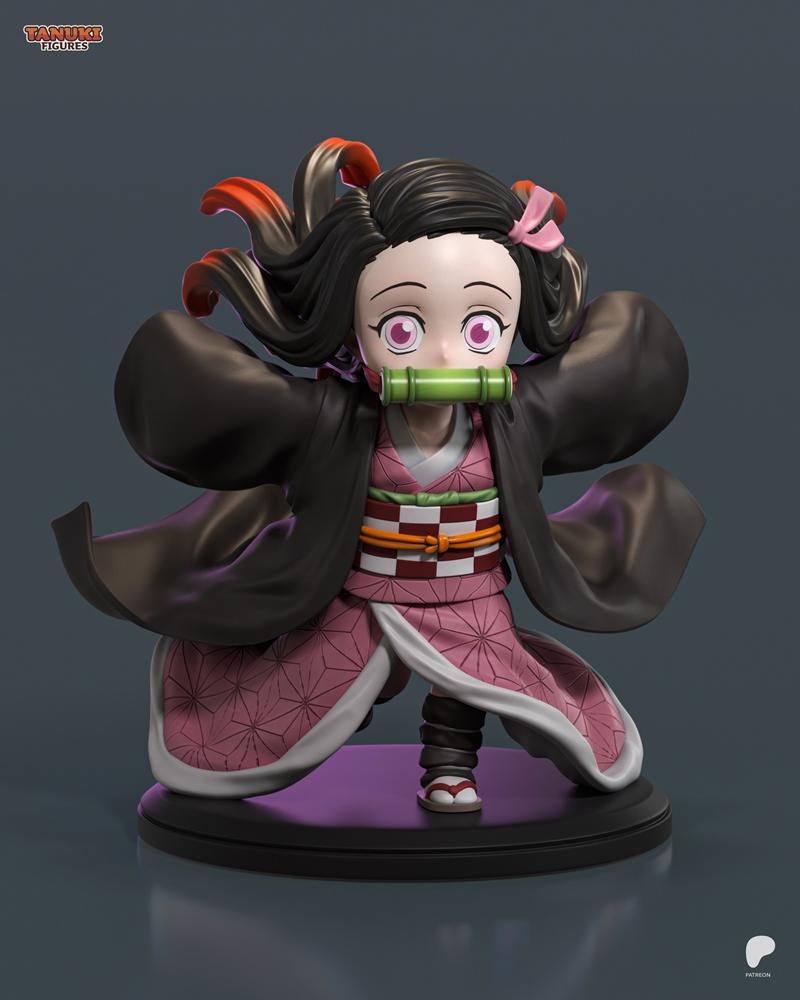 Chibi Nezuko Kamado figure from Demon Slayer, wearing a pink kimono and bamboo muzzle, with large eyes and flowing ha...