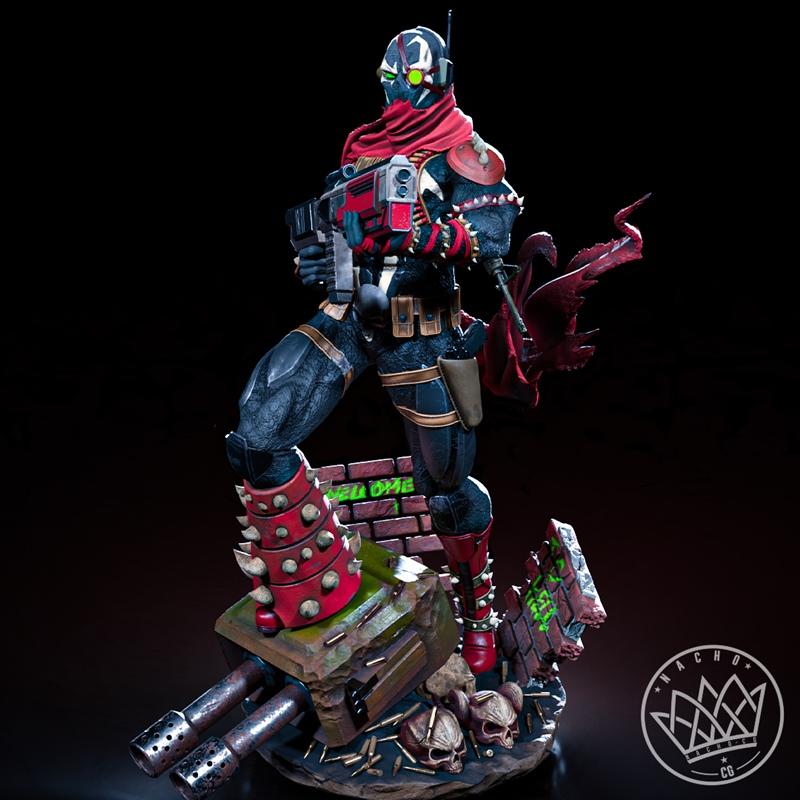 Commando Spawn statue with red scarf and gun, standing on a base with bricks and skulls. Nacho CG model.